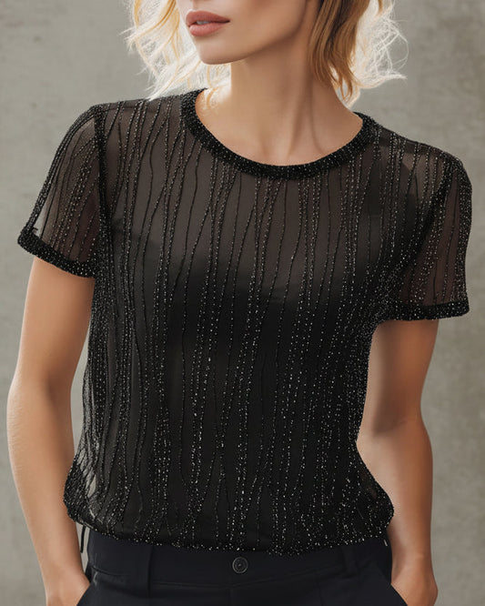 Granada · Top mesh semitransparente con brillo vertica